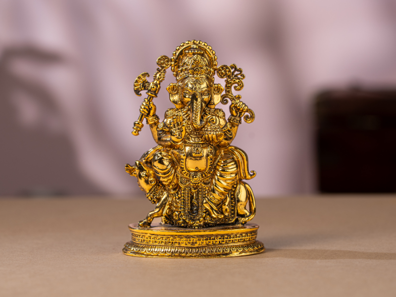 Antique plated Brass Ganesh Idol sitting with Mushak. Medium Statue