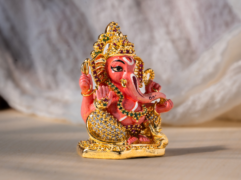 Handmade Enamel gold-plated Brass Ganesh Idol holding Modak. Small Statue.