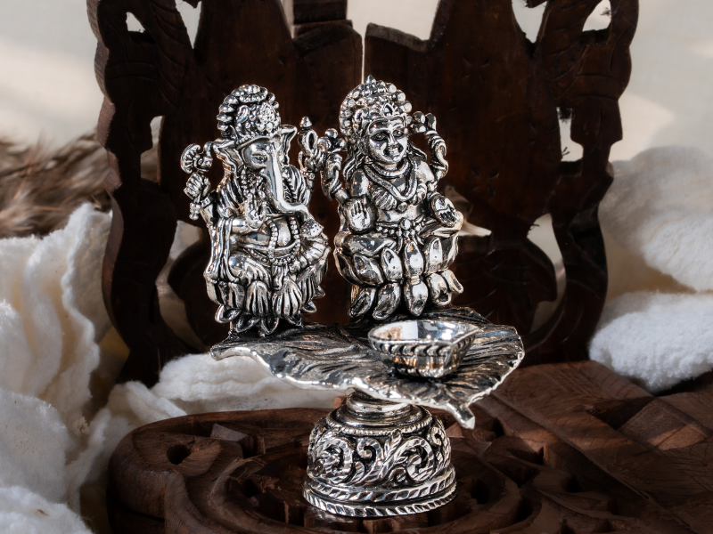 Silver oxidised Brass Lakshmi with Ganesh Diya on Asvaththa Patra with Hand Metal Carving. Medium Diya