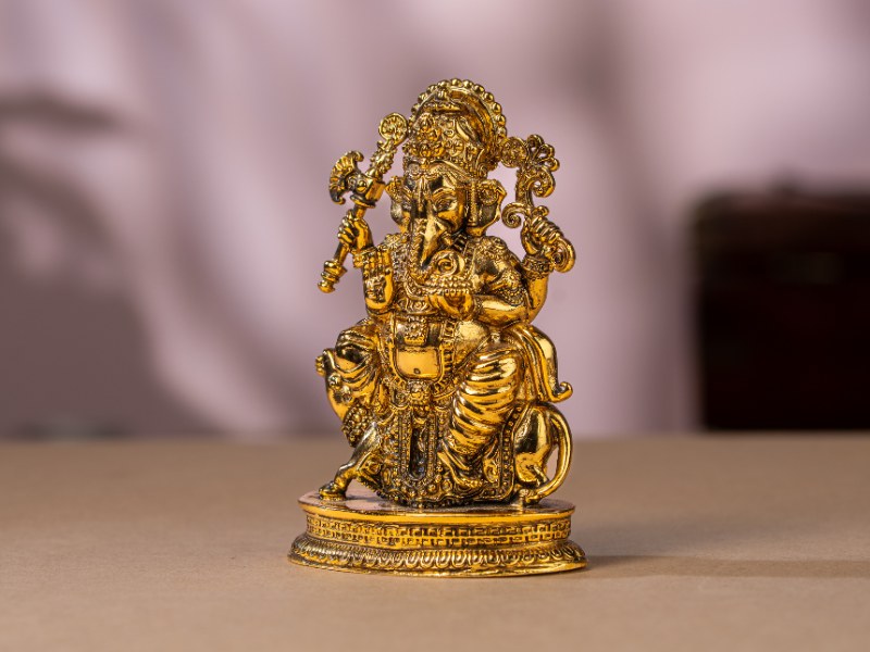 Antique plated Brass Ganesh Idol sitting with Mushak. Medium Statue