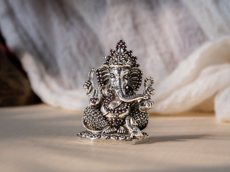 Silver Oxidised Brass Ganesh Idol holding Modak. Small Statue.