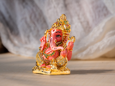 Handmade Enamel gold-plated Brass Ganesh Idol holding Modak. Small Statue.