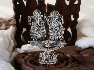 Silver oxidised Brass Lakshmi with Ganesh Diya on Asvaththa Patra with Hand Metal Carving. Medium Diya